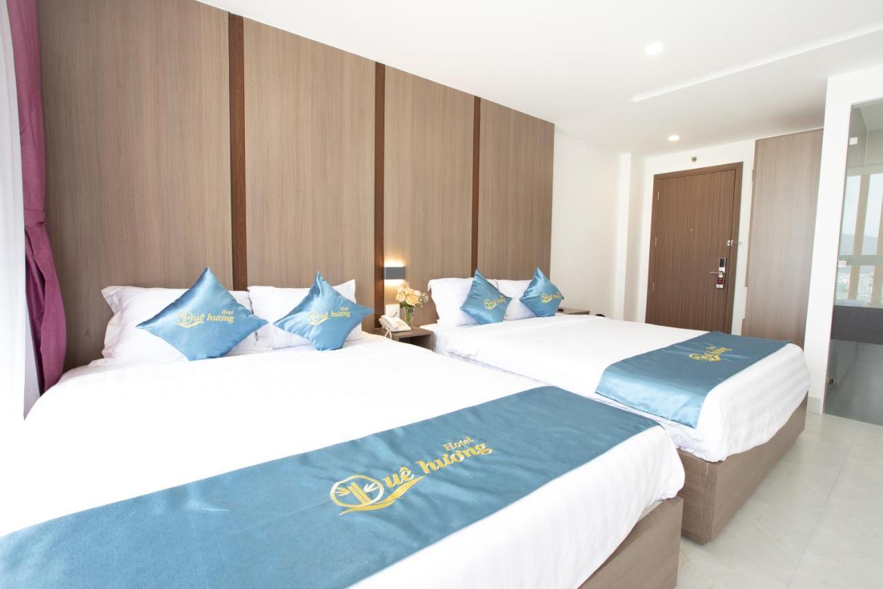 Que Huong Hotel Куинён Экстерьер фото